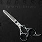 premium hair thinning scissors on black leather background