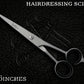 barber scissors for hairdressing on leather background