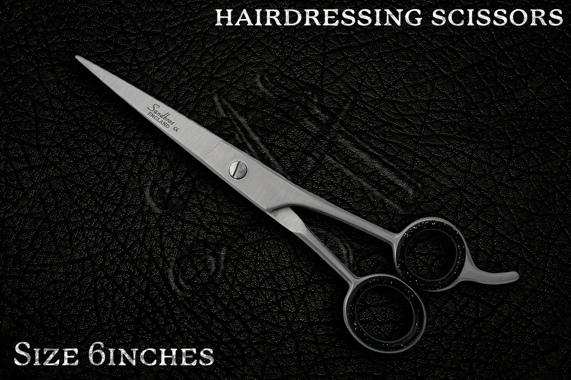 barber scissors for hairdressing on leather background